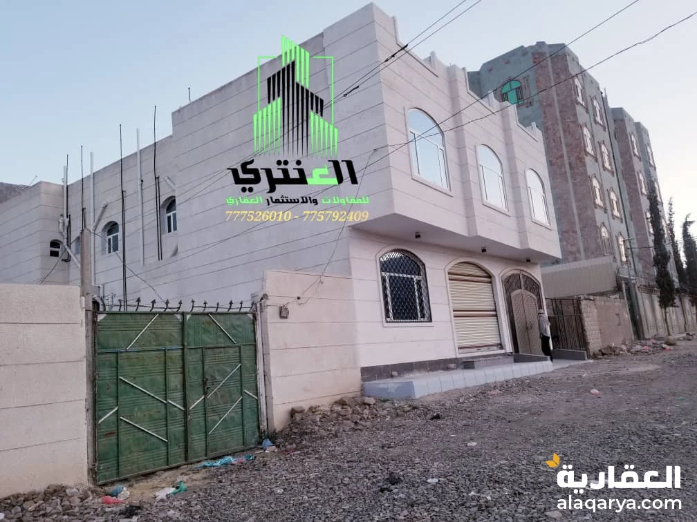 عمارة تجارية دورين ثلاث شقق وفتحة وجراش سيارة وخزان ارضي سوبر لوكس..